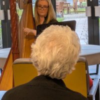 Live Harp Music Visit Delights Residents at Astley View