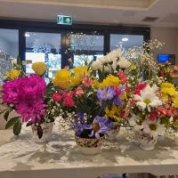 Residents at Astley View Care Home share flower-arranging skills
